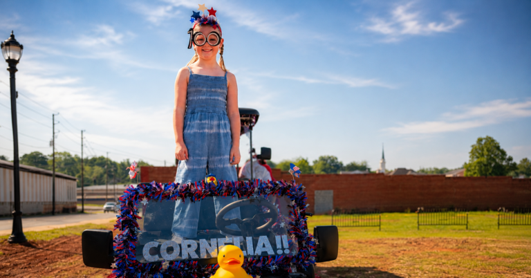 A Surprise Ride for Grace Byers at the Big Red Apple Centennial